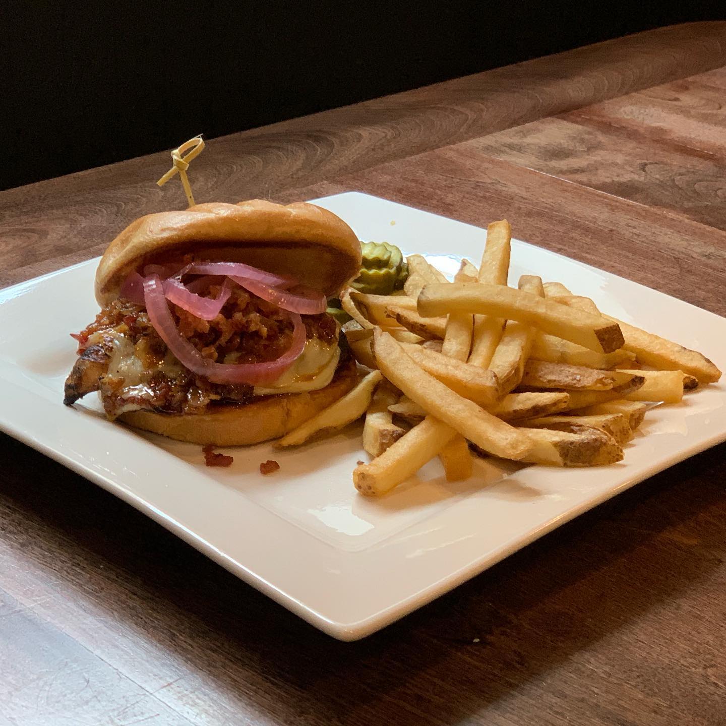 On the board today Bourbon Street Chicken Sandwich Grilled chicken American cheese bacon bourbon jam  pickled onions Lunch is served