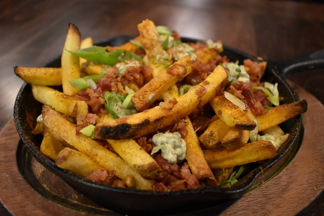 | Shoppers Pub and Eatery Mondays arent so bad when there are Nachos and Fries Join us from 6p to 9p every Monday for 12 priced apps during Happy Hour
