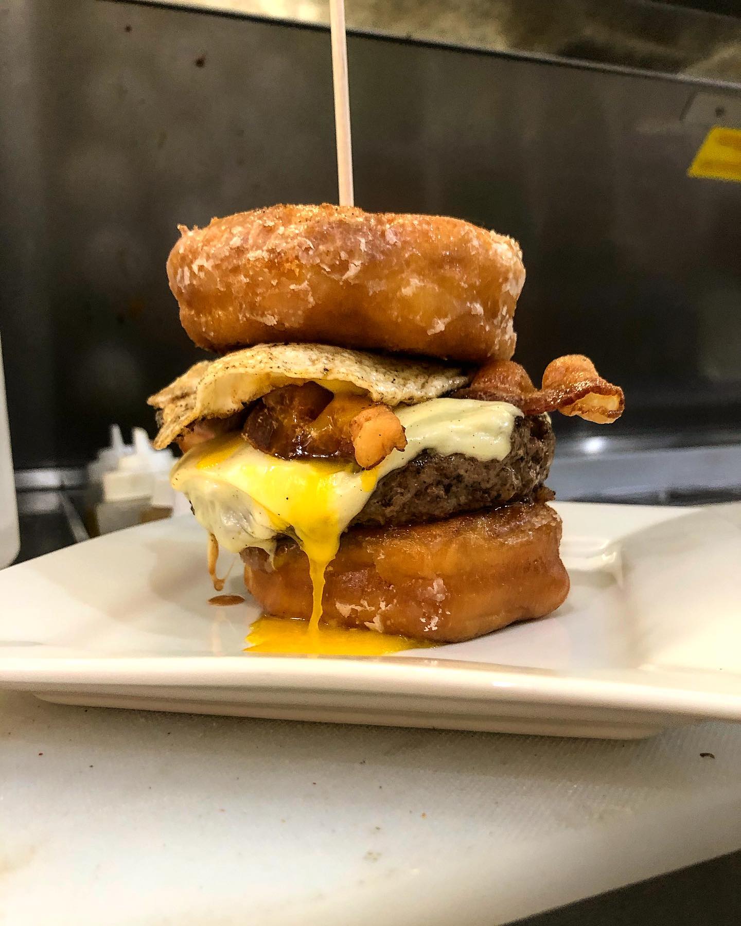 874182369225539448662432735977135548941975n3 | Shoppers Pub and Eatery Doughnut be late for brunch And yes that is a breakfast burger on glazed doughnuts 312020