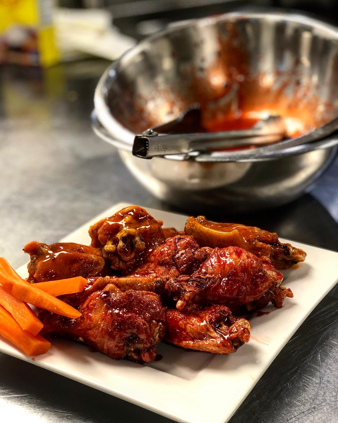 Brined for 4 hours pre cooked to seal in flavor fried to that crispy bite you love and only  on Wednesday nights Best Wings Ever