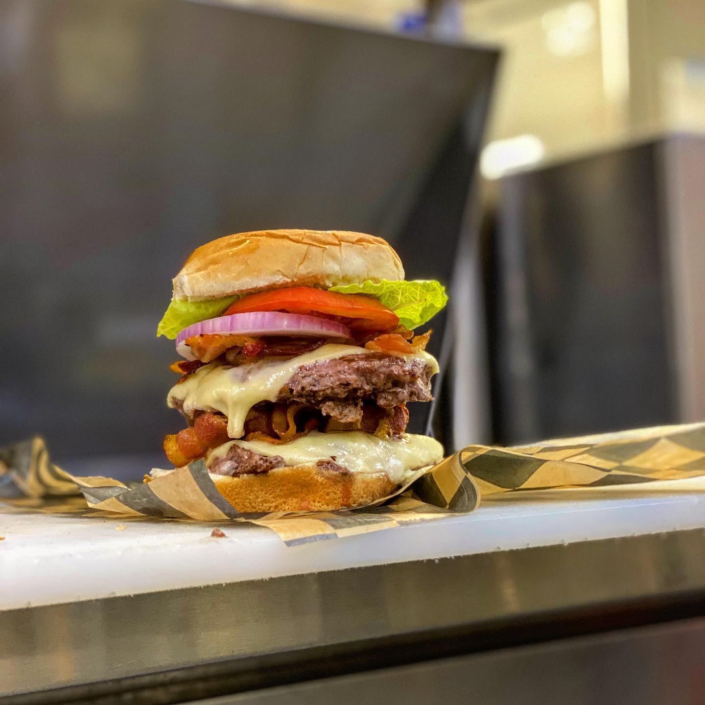 928248518866928617562285307430246525942912n1 | Shoppers Pub and Eatery The deluxe burger is a force to be reckoned with