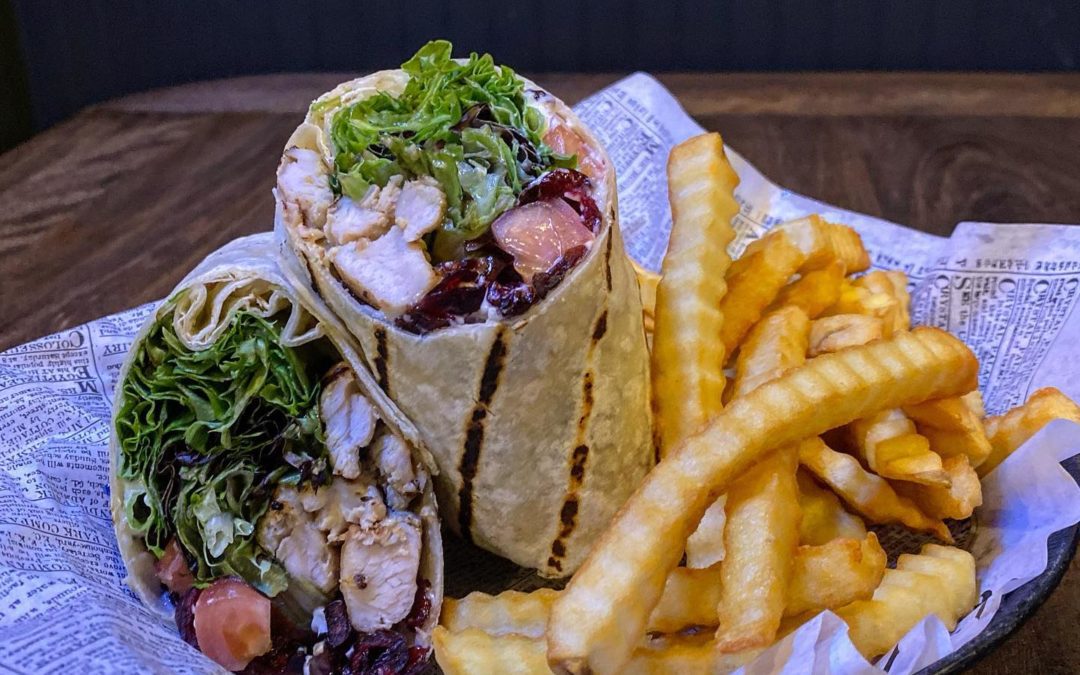 Coulpaaaaa new menu items, like this new Turkey Cran wrap. It’s wicked good. Trust us.
